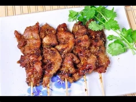 Thai grilled pork known as moo ping. Thai Food - Roasted Homemade Pork (Moo Ping) - YouTube