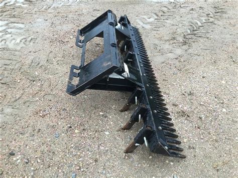 Go from uncleared lot to finished lot with this attachment. Loegering 7' Eliminator Rake Attachment BigIron Auctions