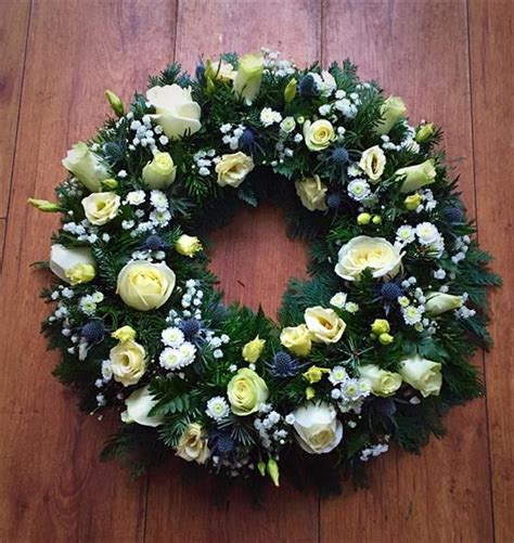 Check spelling or type a new query. Large Wreath - Funeral Flowers Wirral