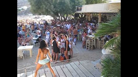 At the trendy alemagou beach bar and restaurant, champagne is already flowing and a german bachelorette party is underway. Super Paradise Beach Mykonos Beach Party - YouTube