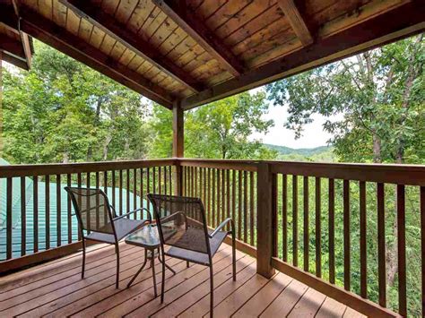 This cabin, built with solid, milled logs, has a few features our other rentals don't have, such as a bedroom on the main floor for more sleeping room, and a hot tub on the back porch for your enjoyment. Cozy Bear Lodge Cabin in Gatlinburg w/ 3 BR (Sleeps12)