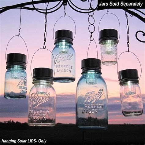 This is an inexpensive and easy way to add charm to any outdoor space. Garden Solar Jar Lights 6 Mason Jar Solar LIDS Garden ...