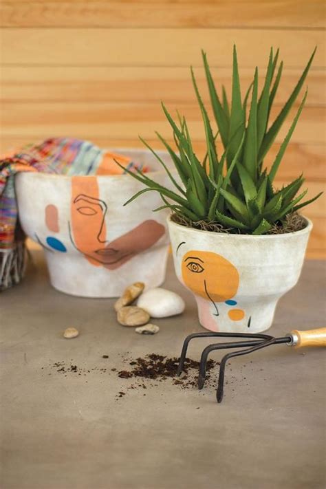 Goldmark guide | buying pots: Set Of 2 Ceramic Pots With Abstract Faces in 2021 ...