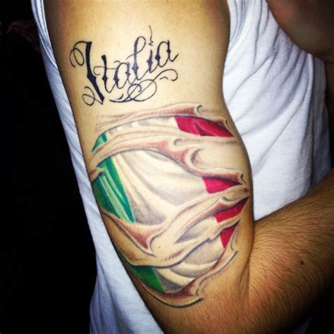 Dont forget to rate and comment this tatto!! Italian flag under torn skin. "Italia"