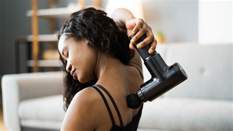 Should you use a massage gun for back pain? | TechRadar