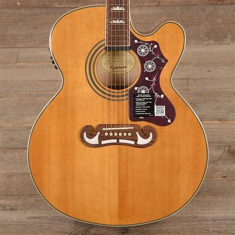 Lee wrathe checks out the classic epiphone ej200ce, taking a close look at all of the features including stereo outputs and iconic mustache bridge. Epiphone EJ-200SCE Solid Top Vintage Natural MINT | Reverb