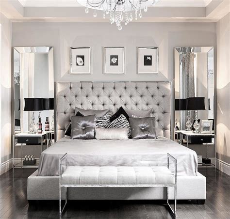 Comfortable modern white and gray bedroom with wooden herringbone parquet floor, bed with blanket and pillows, minimal interior. 40 Gray Bedrooms You'll Be Dreaming About Tonight