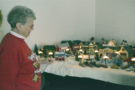 For the tube inserts, measure and then cut a paper towel tube in half. Do-it-yourself project produces a Christmas 'village ...