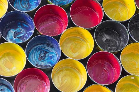 Paint and coating market reportsglobal top 10 and pci 25. Top View Of Old CMYK Paint Cans On Dark Background ...