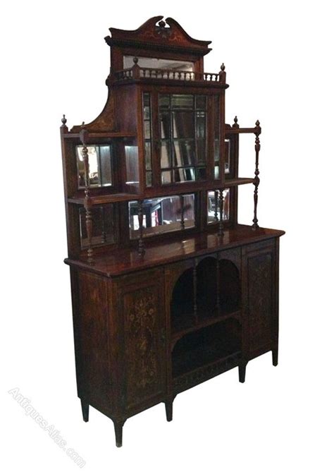 The cabinet is made of beautifully figured rosewood and is a superb quality antique piece which is ideal for display, perfect for storing decorative items or books. Rosewood Display Cabinet - Antiques Atlas