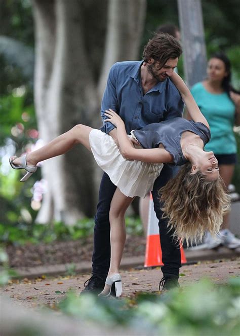 Specific information about the photographic format was not available, but the image appears to have been digitally acquired. Teresa Palmer in Short Skirt on 2 22 set -02 - GotCeleb