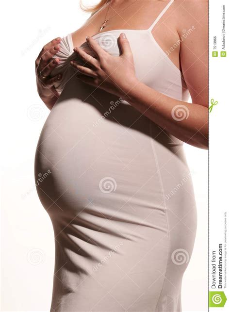 During the early months of pregnancy, women may notice that they urinate frequently, because of pressure of the enlarging uterus on the bladder; Pregnancy body 1 stock photo. Image of life, human, female ...