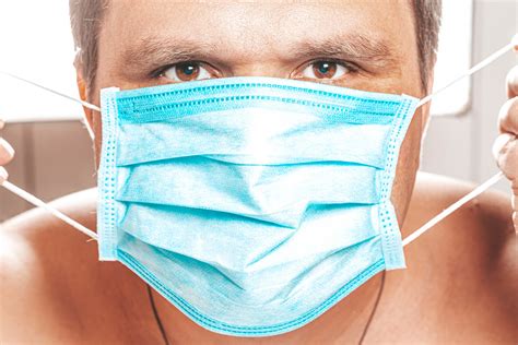 Buy premium quality disposable face mask here at cross protection, the top surgical mask manufacturer in malaysia specialised in medical use face mask. Male face with medical mask. The concept of prevention ill ...