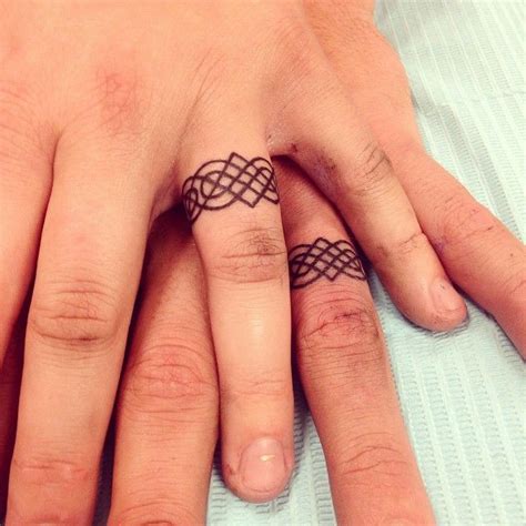 The latest trend when it comes to finger tattoos is is a wedding ring or band finger tattoo. 109 Best Matching Couple Tattoos | Wedding ring finger ...