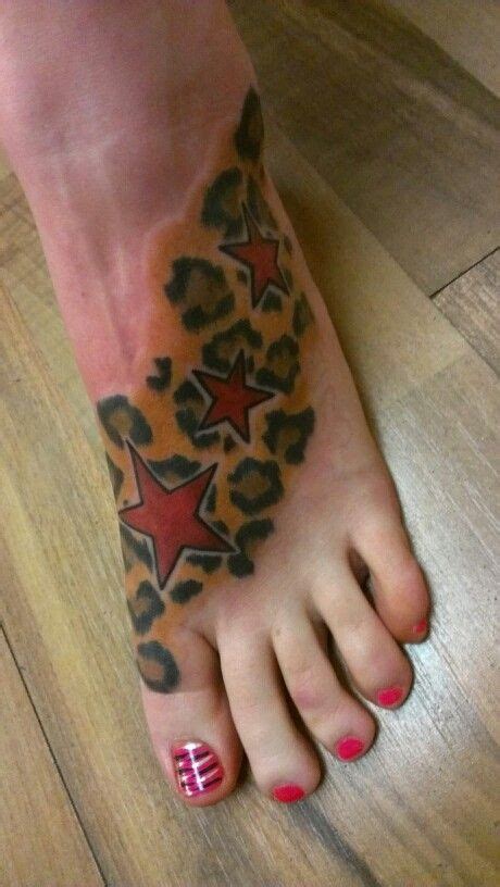 See more ideas about red star, star tattoos, revolutionaries. Leopard print with red stars tattoo | Star tattoos, Foot ...