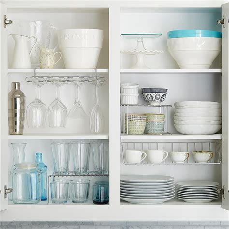 How to style glass kitchen cabinets when we designed our kitchen, i knew i wanted all of the upper cabinets to have glass fronts. Upper Cabinet Organization Starter Kit | Glass kitchen ...