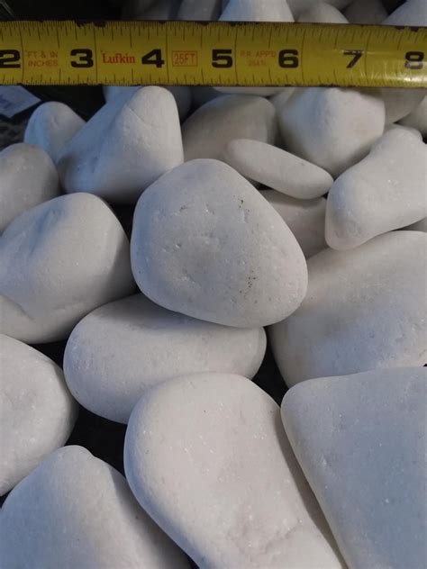 Pebbles are widely used in public buildings, aquarium,villas, garden architecture, paved roads, parks, rockery, bonsai filling materials, garden art. Snow White Pebbles - Clarke's Garden Center & Stone Depot