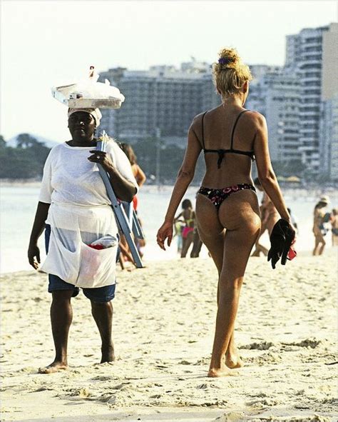 Beaches are to rio what cafes are to paris. Brazilian. Girls in bathing suits on Copacabana Beach in ...