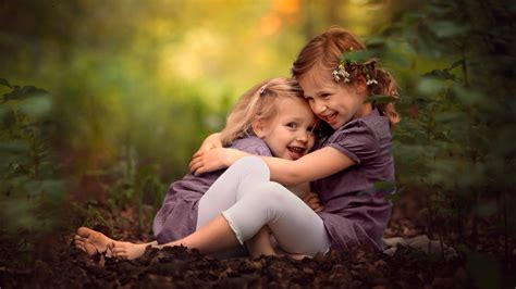 Maybe you would like to learn more about one of these? Two cute little sisters playing in the park wallpapers and ...