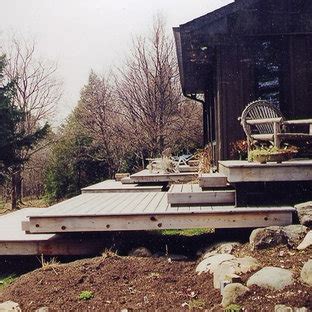 In this example, however, the concrete support needs to reach only to ground level, not above. Suspended Deck | Houzz