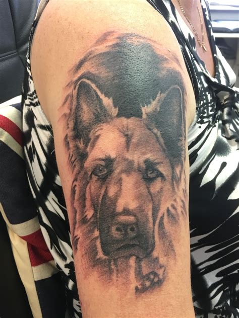 Dog collar with dog license and other dog tags. Blacks and grey dog tattoo by Travis at twisted tattoo Peterborough Follow is on Facebook and ...