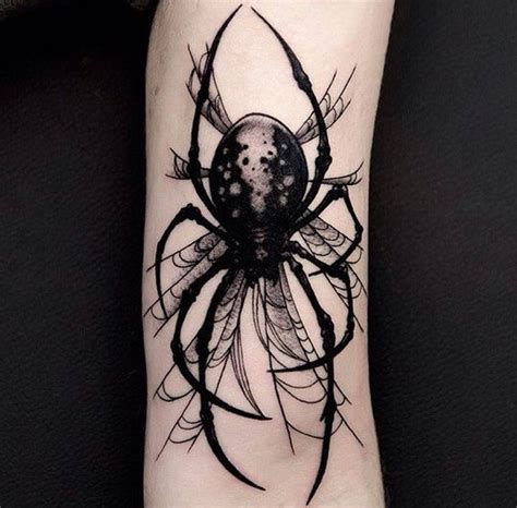 Out of the many animal tattoo designs, snake tattoo is considered as one of the unpopular tattoos compared to the others. No photo description available. | Spider tattoo, Creepy ...