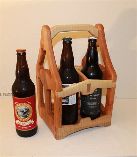 >build it> beer tote plans | now we're talkin.' click the link below for the super simple beer tote building plans. Beer Tote #2, 22 oz Four Pack - by CampD @ LumberJocks.com ...