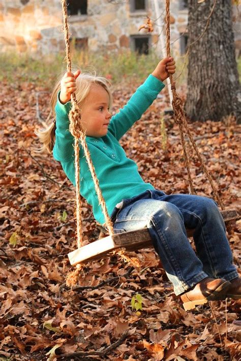 Hgtv explains through photography and for very small children or babies, this wooden tree swing with a protective front and back bar would be the perfect addition to a young family's home. Wood Tree Swing - Tree swing - Childrens swing | Wood tree swing, Childrens swings, Tree swing