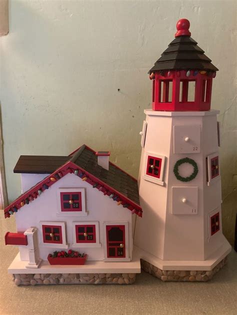 Schrattenthal ist idyllisch gelegen und vollkommen ruhig in der gesamtheit. Adventskalender Haus mit Turm aus Holz | Kaufen auf Ricardo