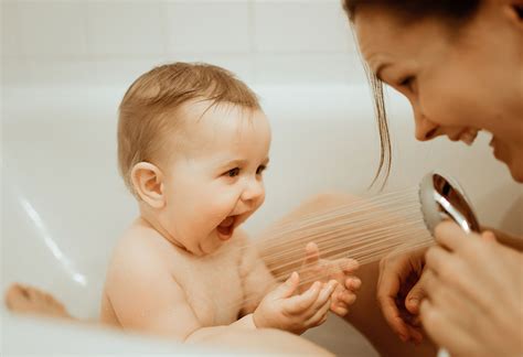 You can buy a shower cap for babies that covers the forehead and ears. Is Co-Bathing with Baby Safe