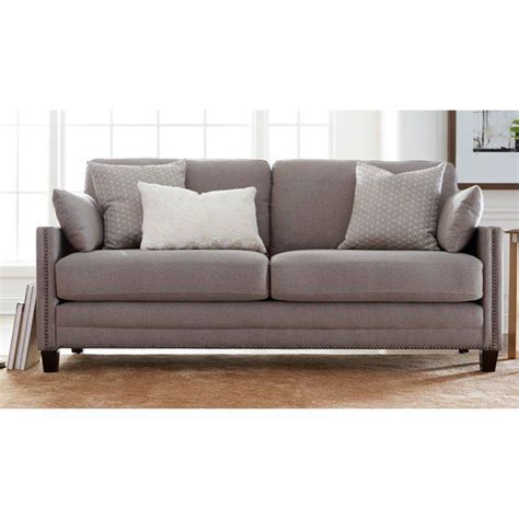 A quality sofa is the anchor—the very foundation—of any living space, and finding the right one can often be a daunting task. Elle Decor Bella Nailhead Fabric Sofa in French Ivory ...