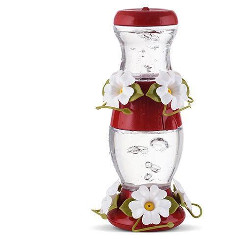 Fancy hummingbird feeders there are many fancy looking hummingbird feeders, some of which double as a feeder feeder care clean your feeder regularly to prevent build up of mold and mildew. Perky-Pet® 26 oz Double Deck Plastic Hummingbird Feeder