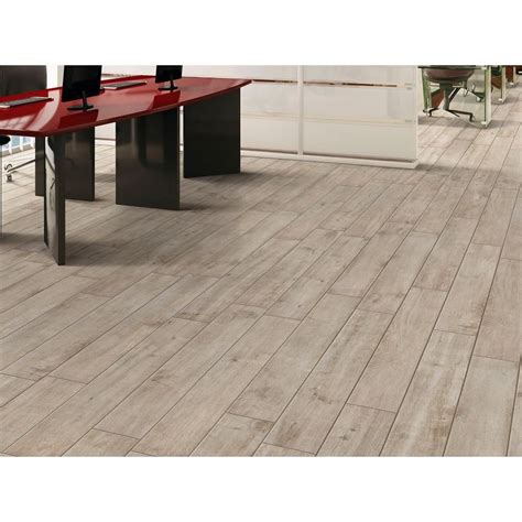 Let the variety and durability of natural stone. Tabula Fog Wood Plank Porcelain Tile - 6in. x 40in ...