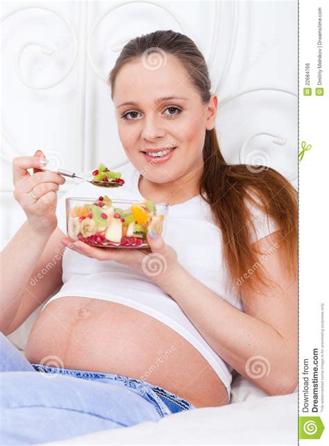 Tips for healthy desserts while pregnant. Pregnant Woman And Healthy Food Stock Photo - Image of ...