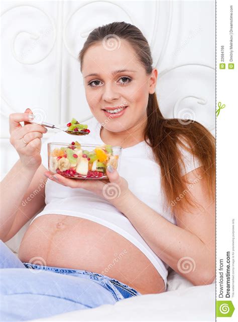 Healthy indian dessert recipes for pregnant woman includes muesli square bars, carrot pancakes,soya kheer etc.pregnancy is a time to pamper yourself because mother's happiness ensures the baby's happiness and her health ensures the baby's.these delicious desserts are a perfect option. Pregnant Woman And Healthy Food Stock Photo - Image of ...