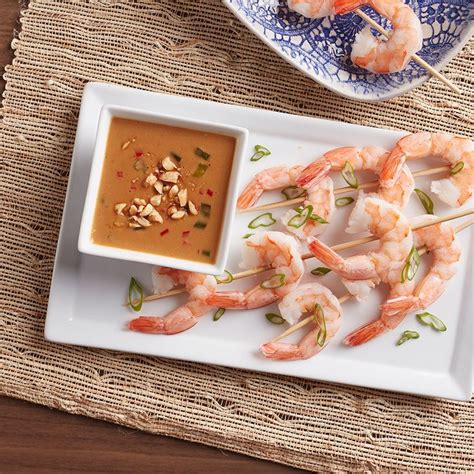 In a food processor, puree the chicken stock, coconut milk, lime juice, soy sauce, fish sauce, hot sauce, chopped garlic, and ginger. Jumbo shrimp with peanut dip | Recipe | Recipes, Dip ...