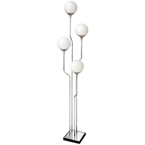 Letting you get the glow right where you need it, this floor lamp is perfect for reading books and studies alike. Mid-Century Modern Chrome, Four Glass Globes Floor Lamp | Globe floor lamp, Floor lamp, Lamp