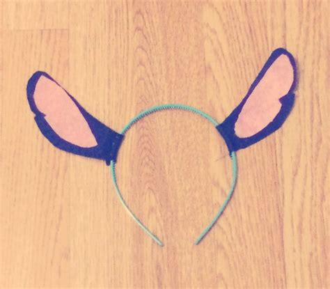 As i mentioned in this party post, my daughter adores stitch from. DIY LILO and stitch ears for your Halloween costume | Stitch ears, Disney couple costumes ...