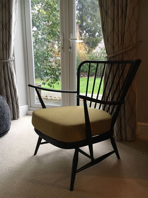 With dark walnut solid wood frame, this accent armchair makes a great statement in your living room, bedroom, reception office, and most of the contemporary home decor frames crafted with solid rubberwood. Ercol armchair , black wood , ercol jubilee armchair ...