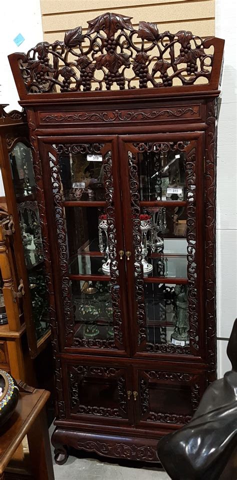 Check out our rosewood cabinet selection for the very best in unique or custom, handmade pieces from our shops. HIGHLY CARVED ROSEWOOD DISPLAY CABINET