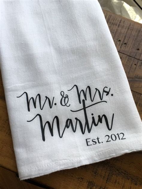 Every wedding photographer loves getting a shot of them while the bride gets ready, and it's an easy gift to hang on and use after the wedding. Personalized Mr and Mrs Kitchen Towel Custom Wedding Gift ...