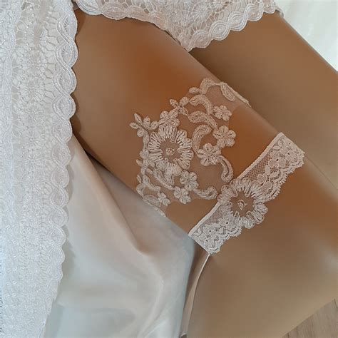 *gorgeous handmade ivory lace garter set it's perfect for your special day! Wedding garter set Ivory silver frame garter Lace garter ...