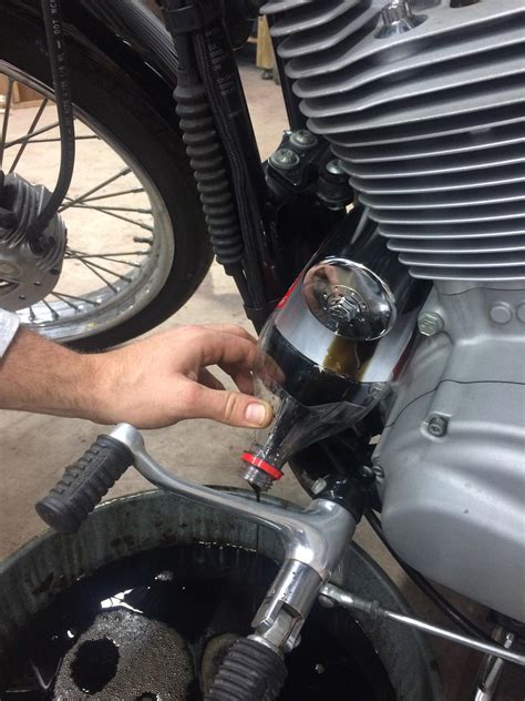 Drain the engine oil into an oil pan. D.I.Y.: Easy-to-Make Sportster Oil Filter Funnel - Harley ...