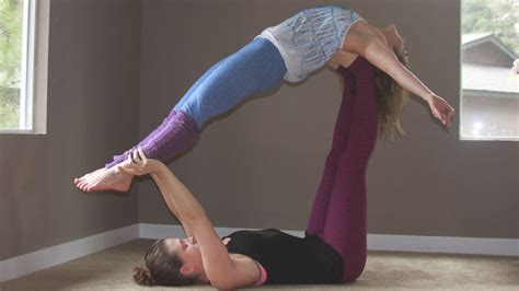 These yoga poses for two are perfect for beginner to intermediate yogis. Beginners Guide to Acro Yoga - Rachael Flatt