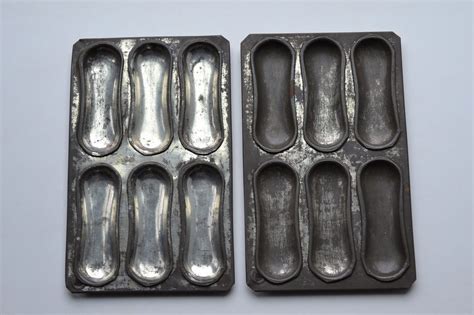 Julia, store bought lady fingers won't work for this recipe. English Lady Finger Baking Pans | Chocolate molds, Molding ...