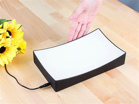 The main advantage is the switching mechanism won't gunk up and fail over time. USB Touch-Sensitive Tray Lamp