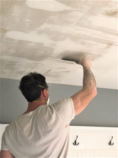 Saturate a small, manageable area of the ceiling with water. How to Remove Popcorn Ceilings Like a Pro - Smoothing ...