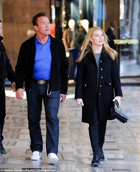 Select the details below that best describe this video. Arnold Schwarzenegger arrives at Bambi Awards in Berlin ...