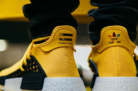 The shoes feature a bight yellow just as we do for every yeezy release, we have a full list of every confirmed retailer stocking the upcoming pharrell adidas nmd's, along with. Pharrell adidas Boost NMD Human Race | SneakerFiles