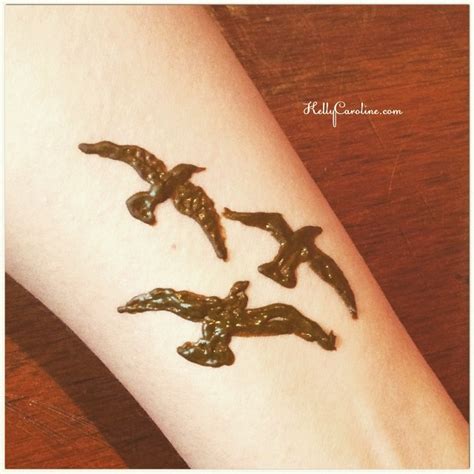 A family came in to have henna tattoos to celebrate their cousin coming back into town from washington d.c. Henna by Kelly Caroline, Cute bird henna tattoo design on ...